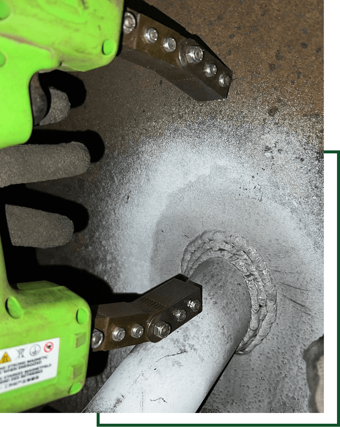 Close-up of a pipe welding clamp
